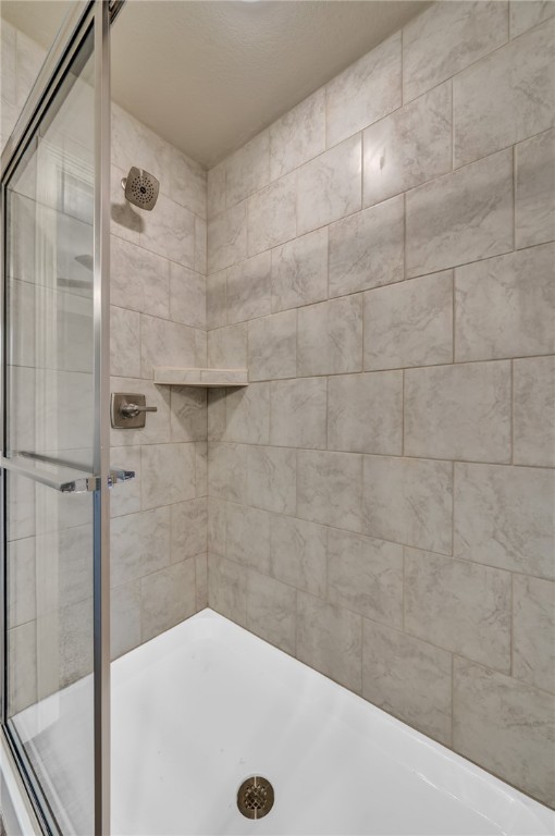 1236 High Street Navasota, TX 77868 - Photo 10 of 14 a bathroom with a tub and a shower