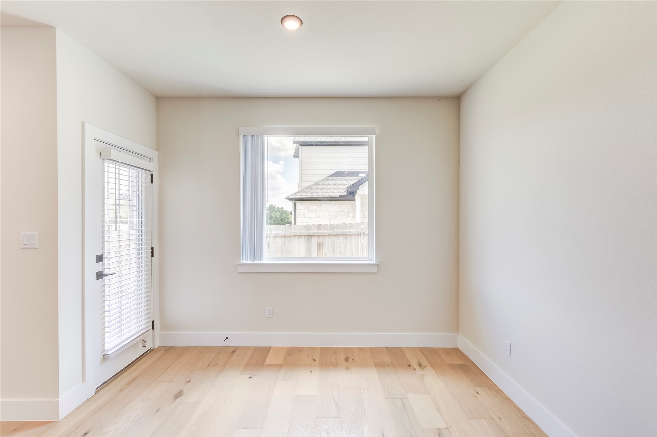 2600 Gattis School Road, Unit 401 Round Rock, TX 78664 - Photo 16 of 29 Spare room featuring light wood-style flooring and baseboards