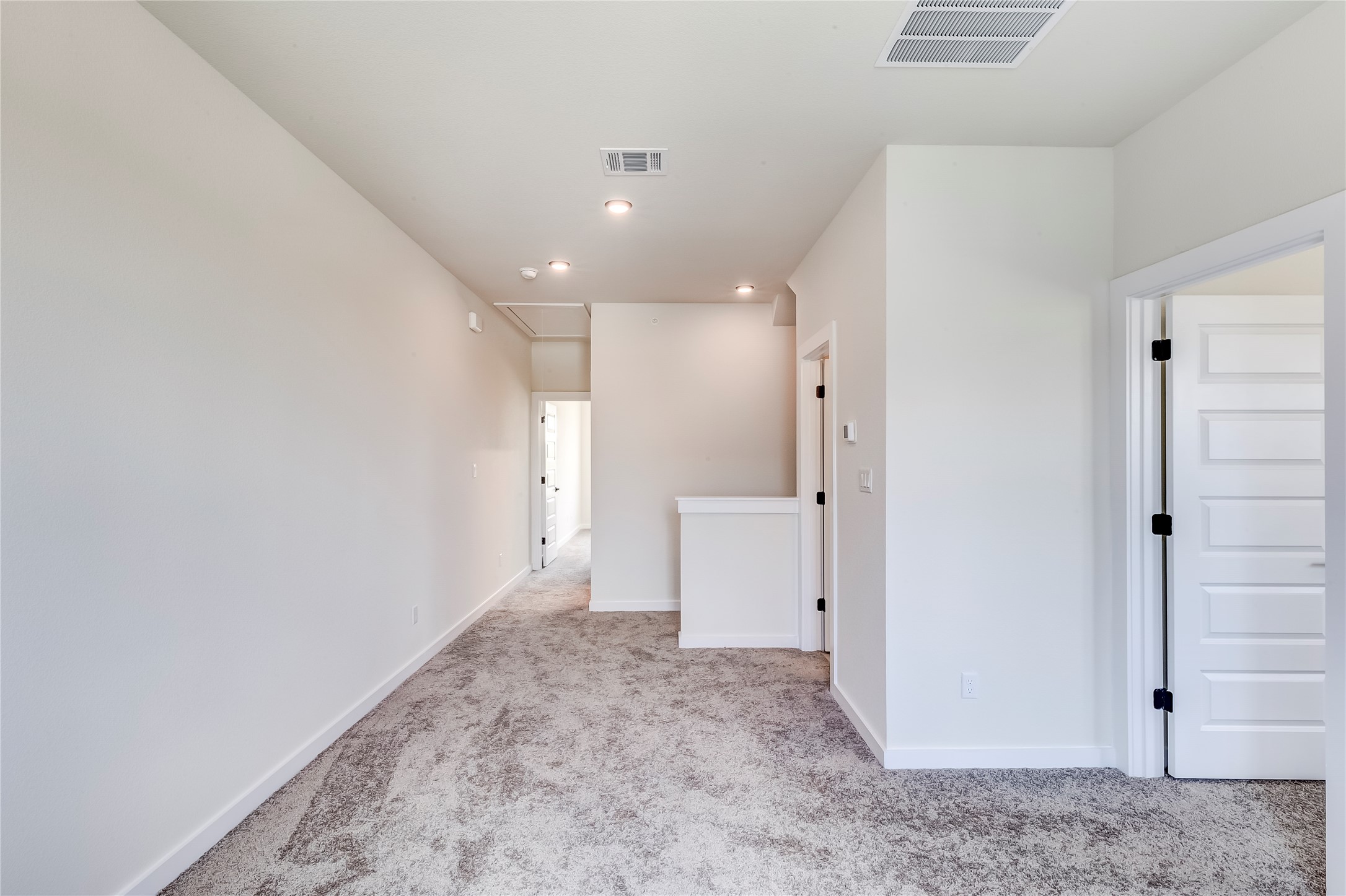 2600 Gattis School Road, Unit 401 Round Rock, TX 78664 - Photo 23 of 29 Spare room featuring light carpet and recessed lighting