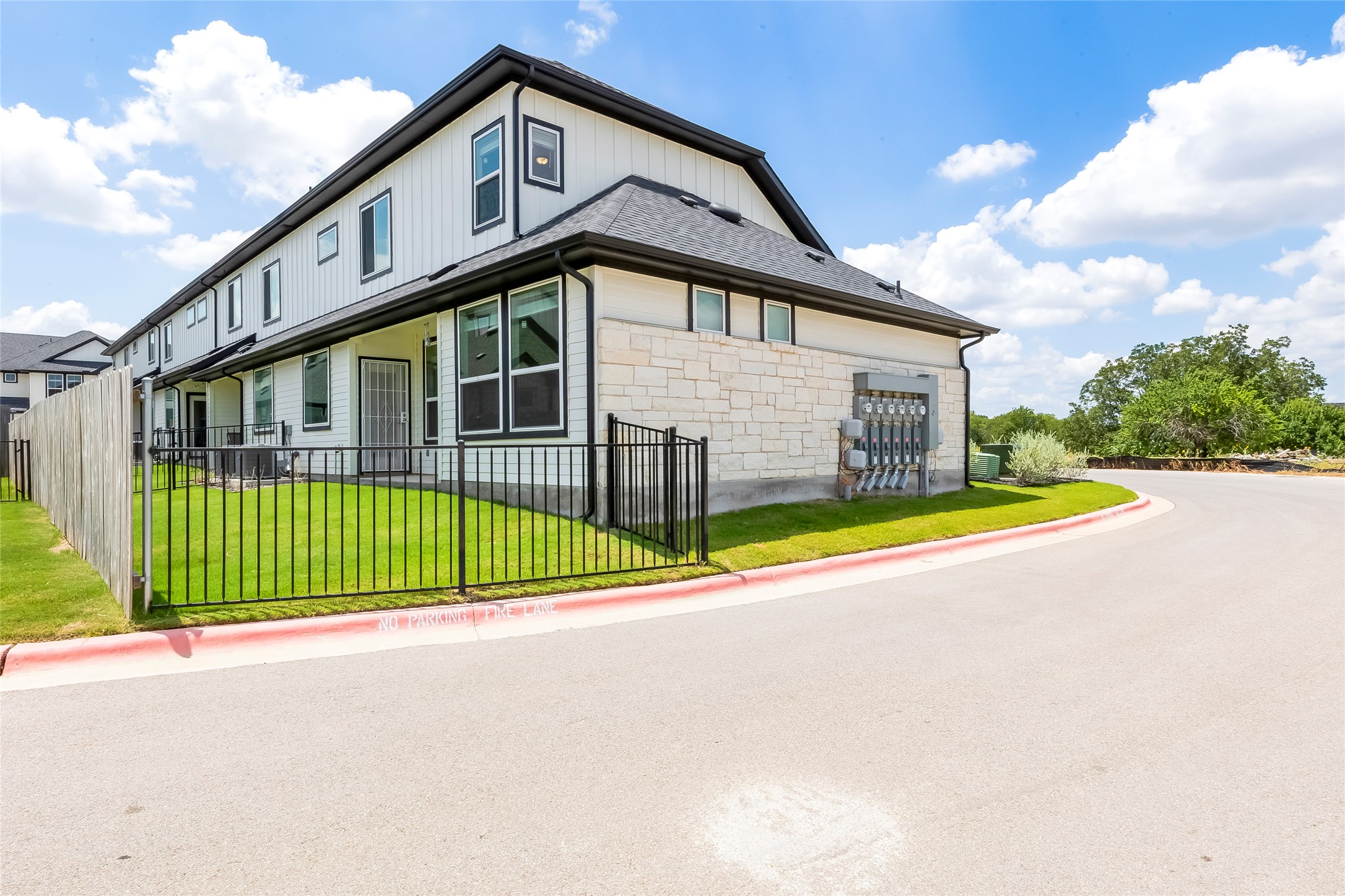 2600 Gattis School Road, Unit 401 Round Rock, TX 78664 - Photo 5 of 29 View of home's exterior featuring stone siding