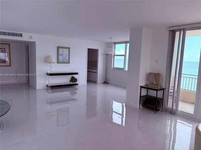 a kitchen with a sink cabinets and window