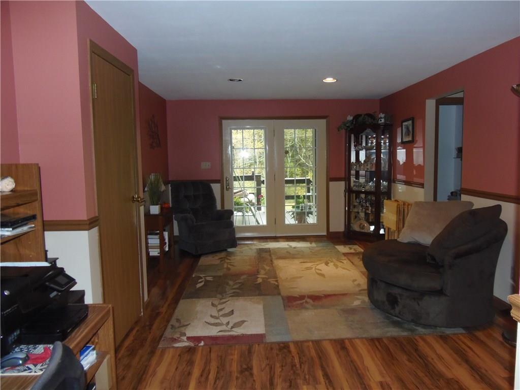 210 Diane Drive Rural Valley, PA 16249 - Photo 10 of 18 Large Family Room With Doors Leading To The Deck