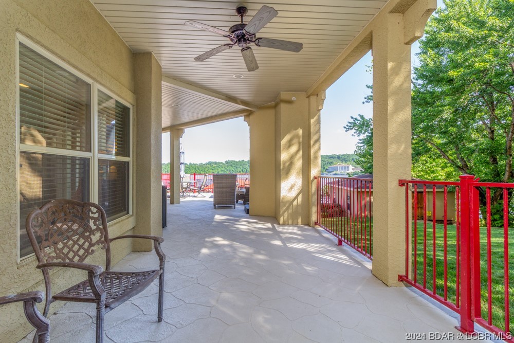 3168 Twin Rivers Point, Unit 1E Camdenton, MO 65020 - Photo 37 of 50 LARGE WRAP AROUND COVERED PATIO W/LARGE OPEN AREA