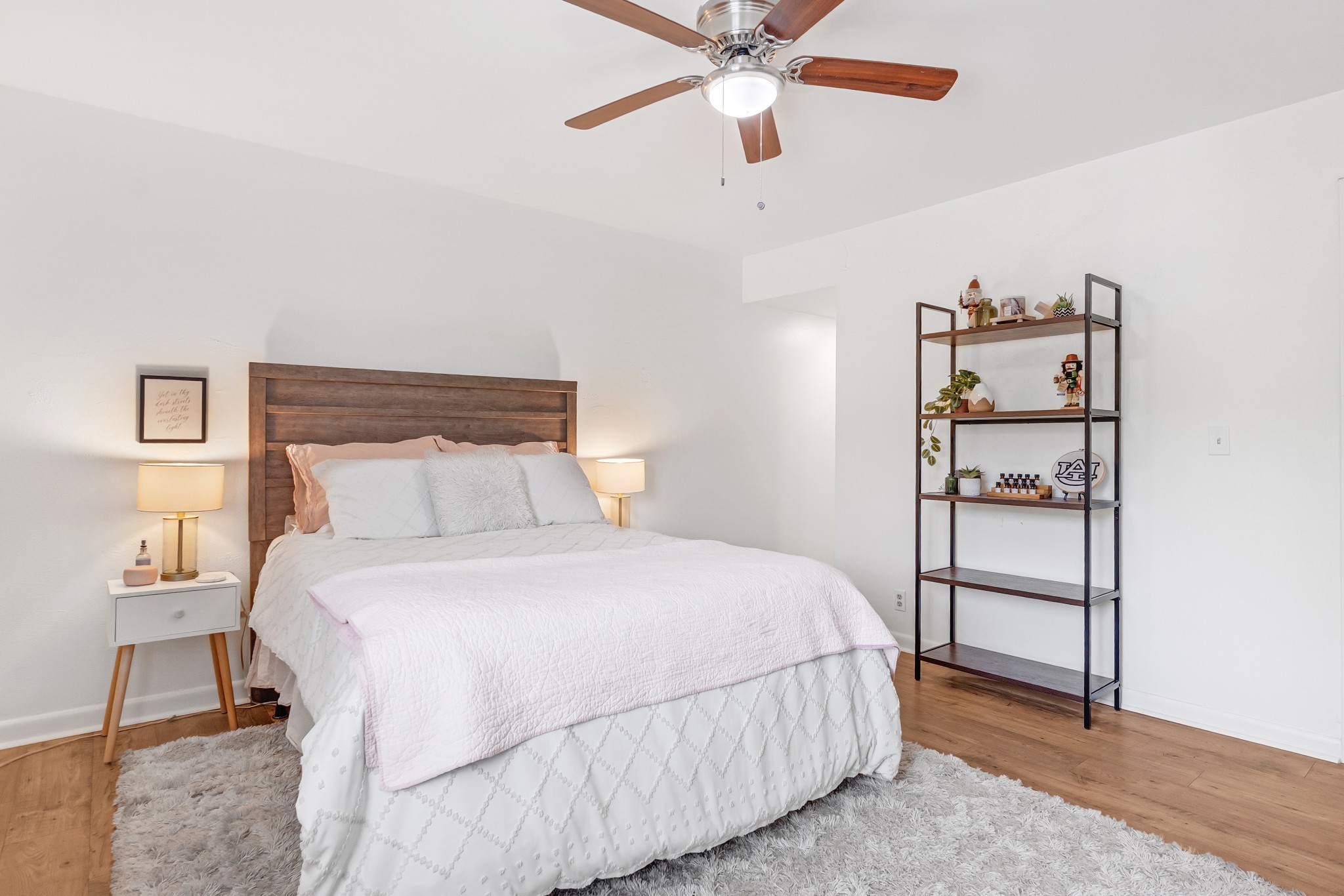 21 Vaughns Gap Road, Unit 88F Nashville, TN 37205 - Photo 17 of 30 a bedroom with a bed and a chandelier