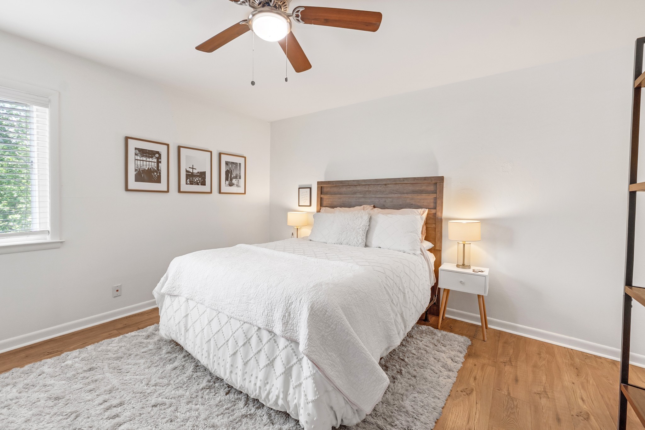 21 Vaughns Gap Road, Unit 88F Nashville, TN 37205 - Photo 18 of 30 a bedroom with a bed and painting on the wall