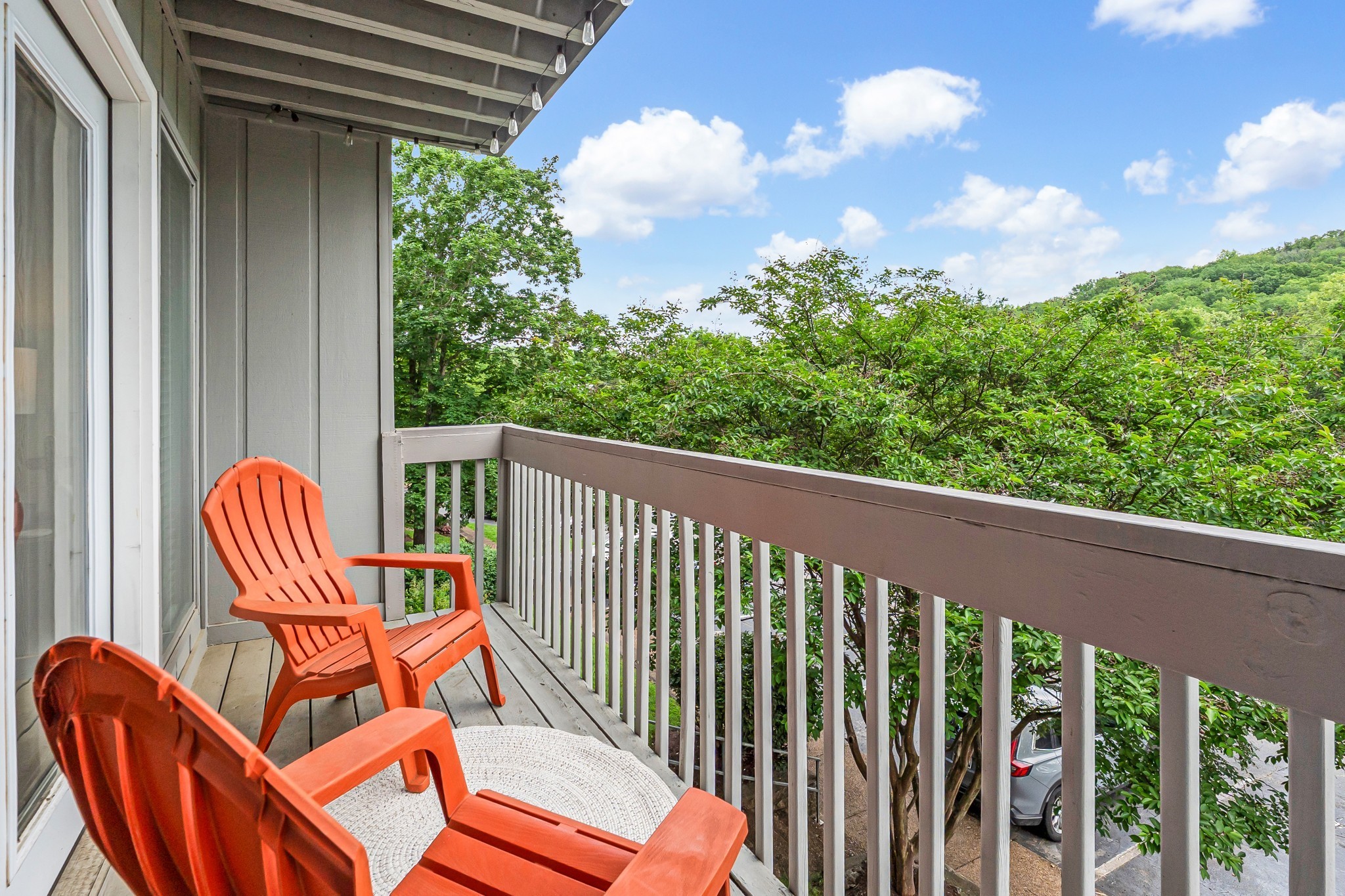 21 Vaughns Gap Road, Unit 88F Nashville, TN 37205 - Photo 5 of 30 a view of a two chairs in the balcony