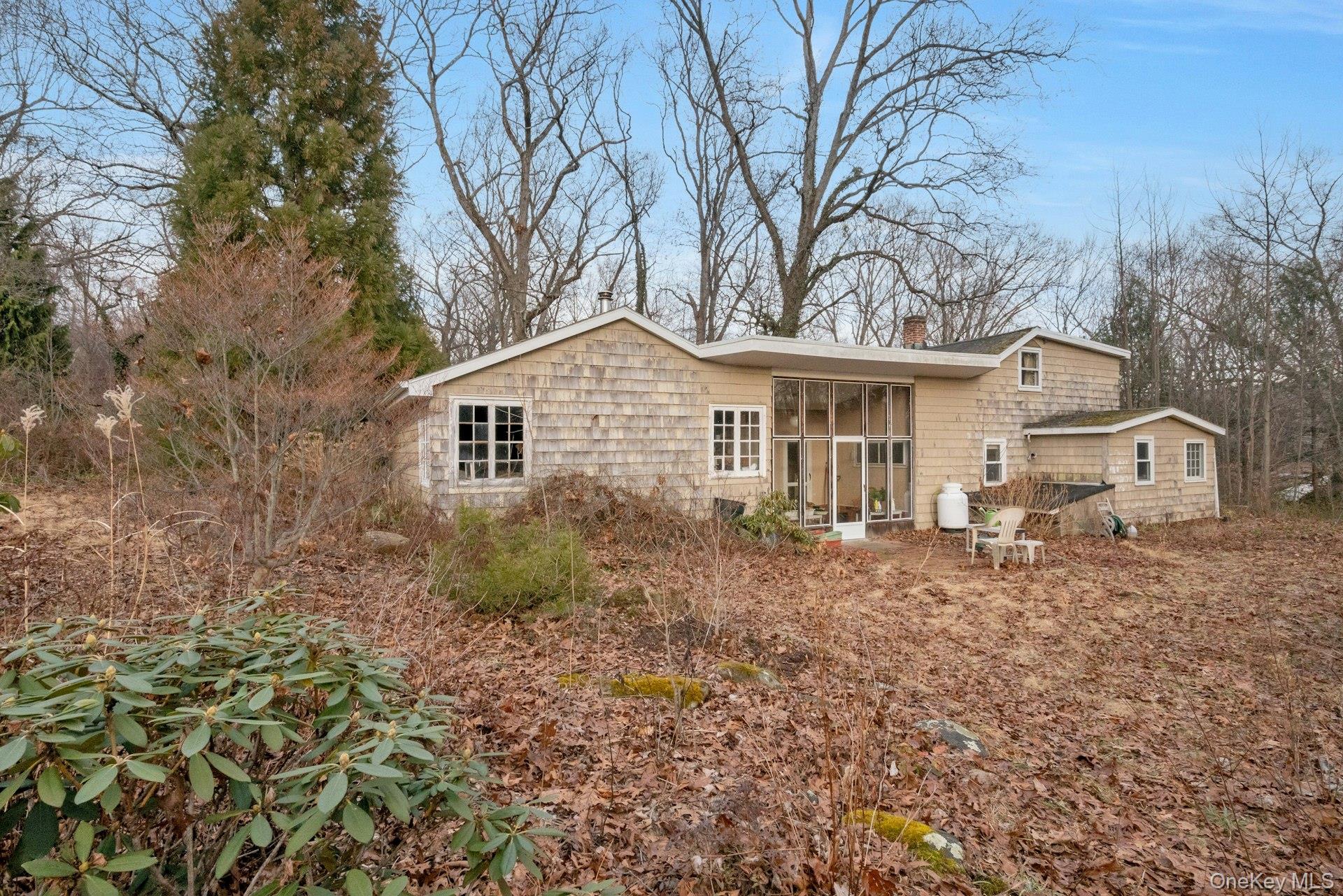 14 Glendale Road Ossining, NY 10562 - Photo 2 of 18 Sun Room Walkout to the Backyard, Mature Trees and Usable Acreage.