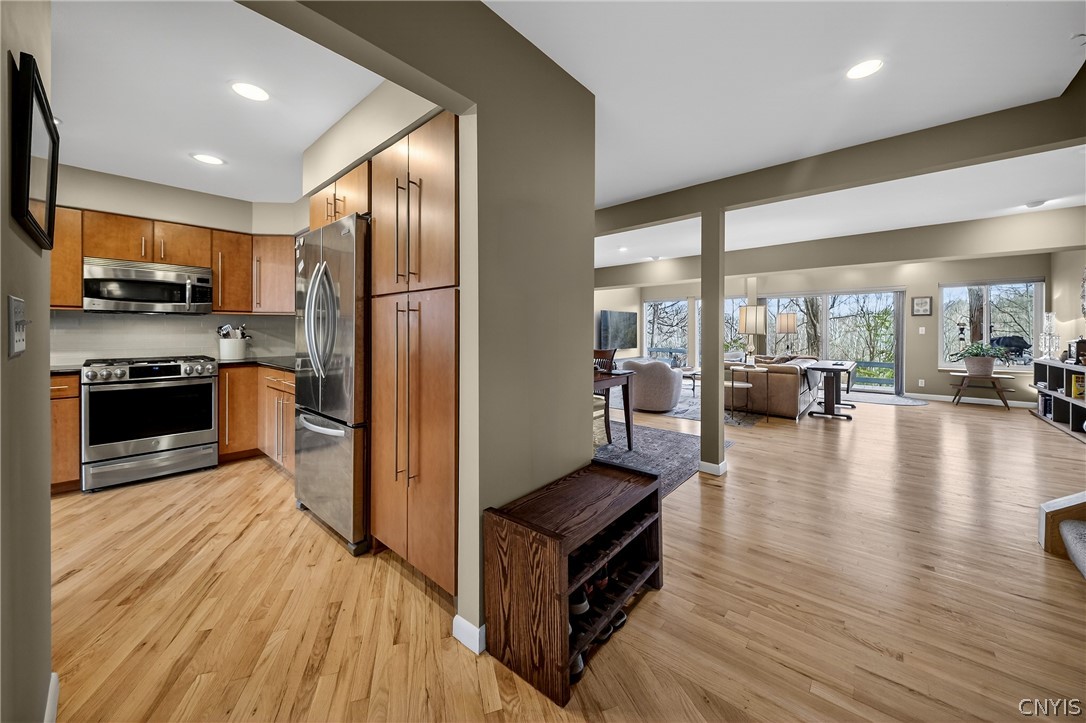 7516 Spectrum Way Manlius, NY 13066 - Photo 4 of 49 As you walk in the front door, kitchen space to th