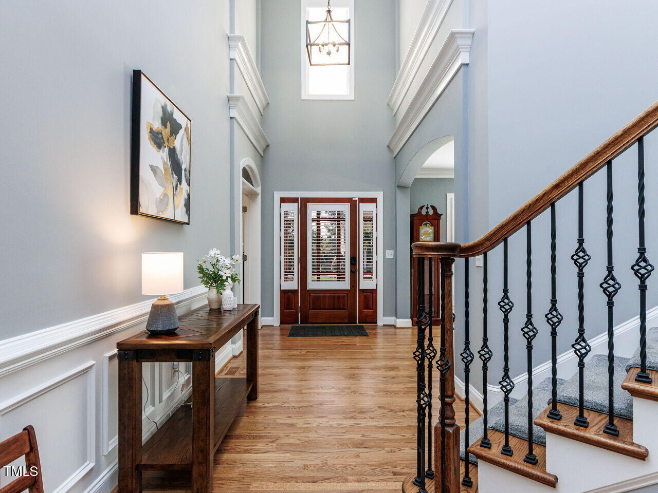 1808 Pattersons Mill Road Durham, NC 27703 - Photo 4 of 42 2 Story foyer and Living Area adorned double crown molding.