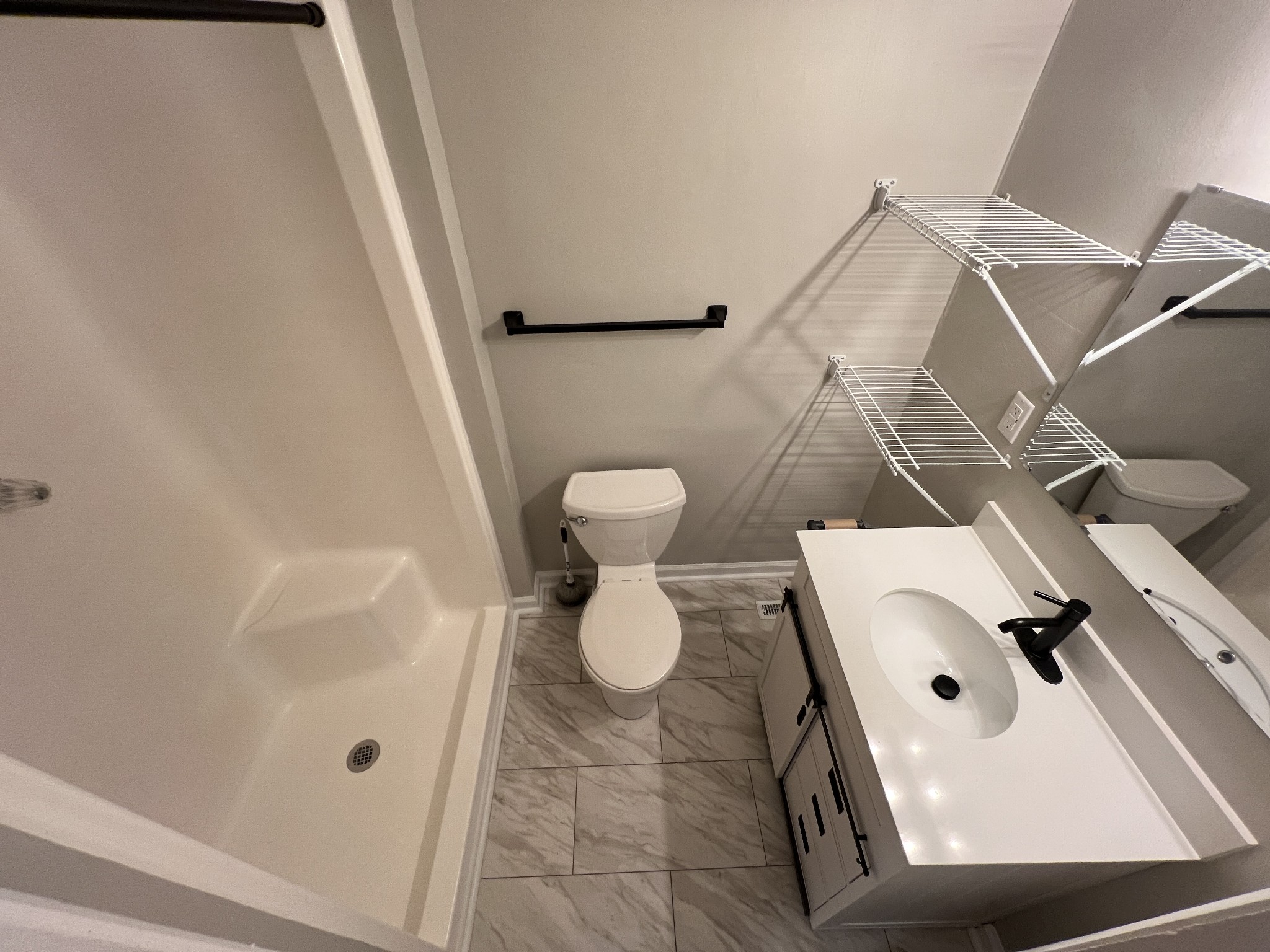 721 North Maple Street, Unit B Murfreesboro, TN 37130 - Photo 12 of 13 a bathroom with a sink and toilet