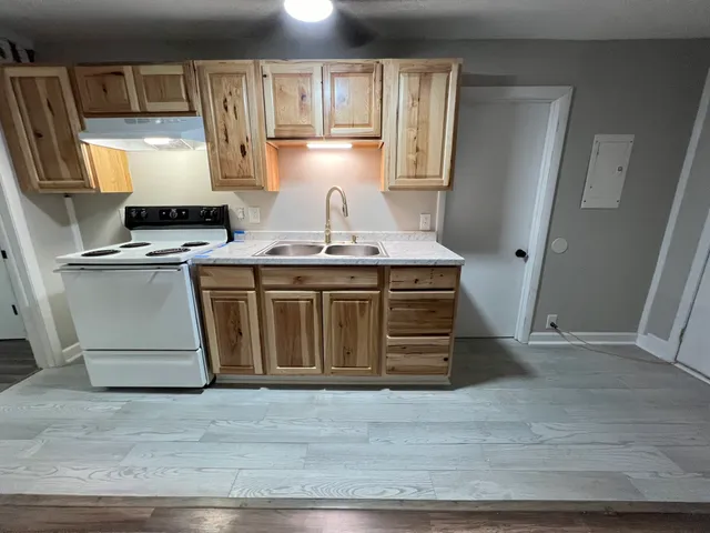 a view of a kitchen with appliances