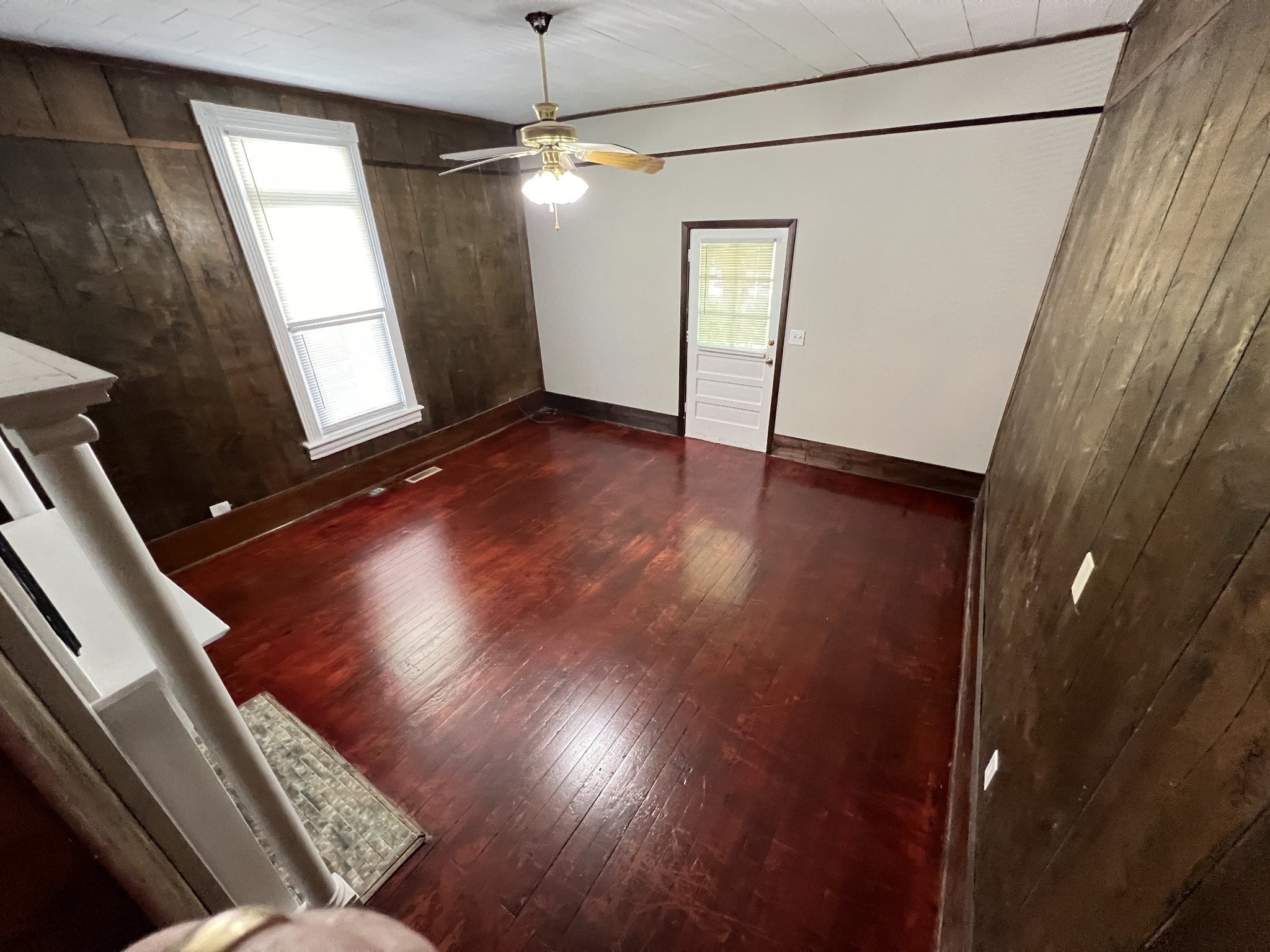 721 North Maple Street, Unit B Murfreesboro, TN 37130 - Photo 3 of 13 a view of an empty room with wooden floor and a window