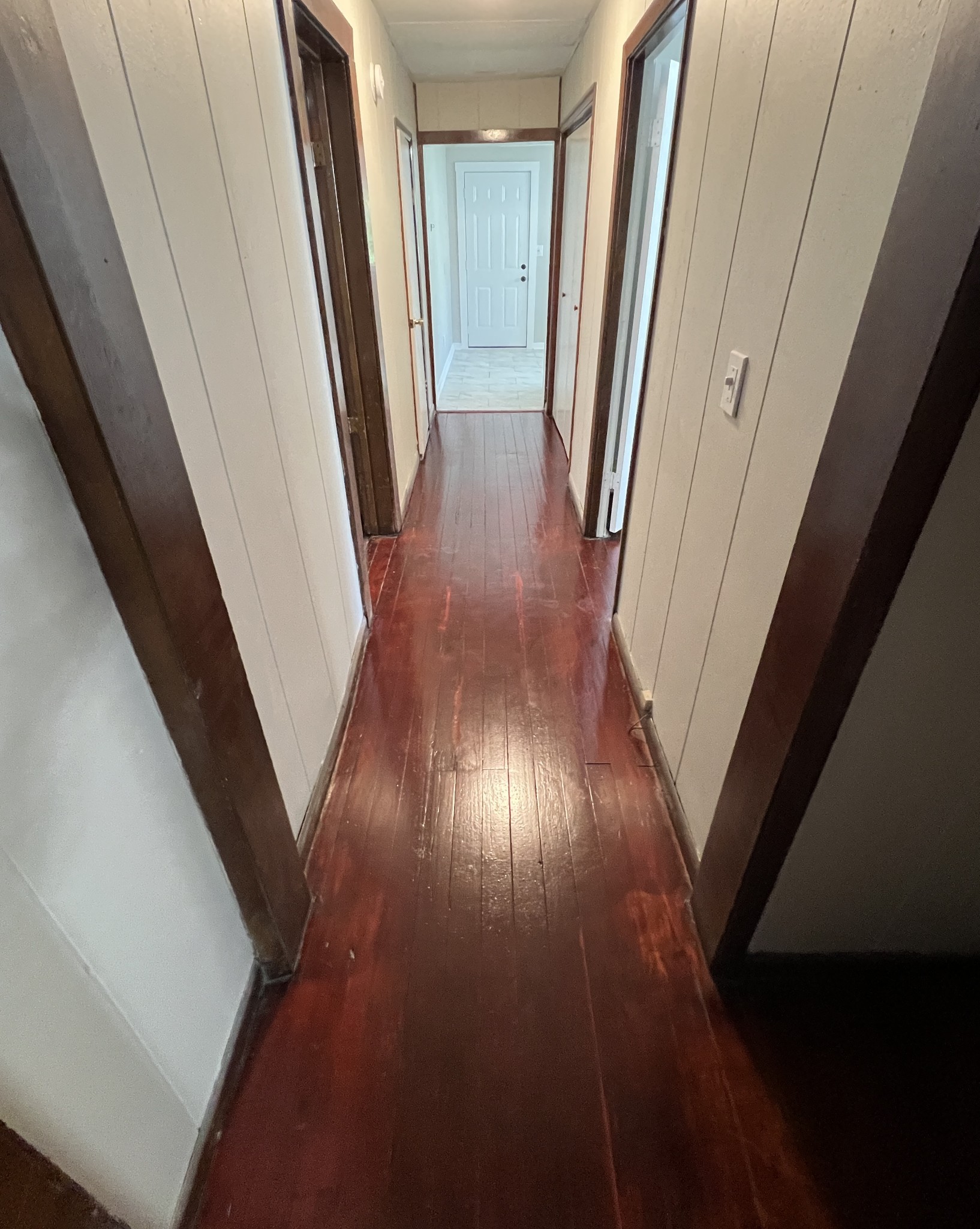 721 North Maple Street, Unit B Murfreesboro, TN 37130 - Photo 7 of 13 a view of a hallway with wooden floor