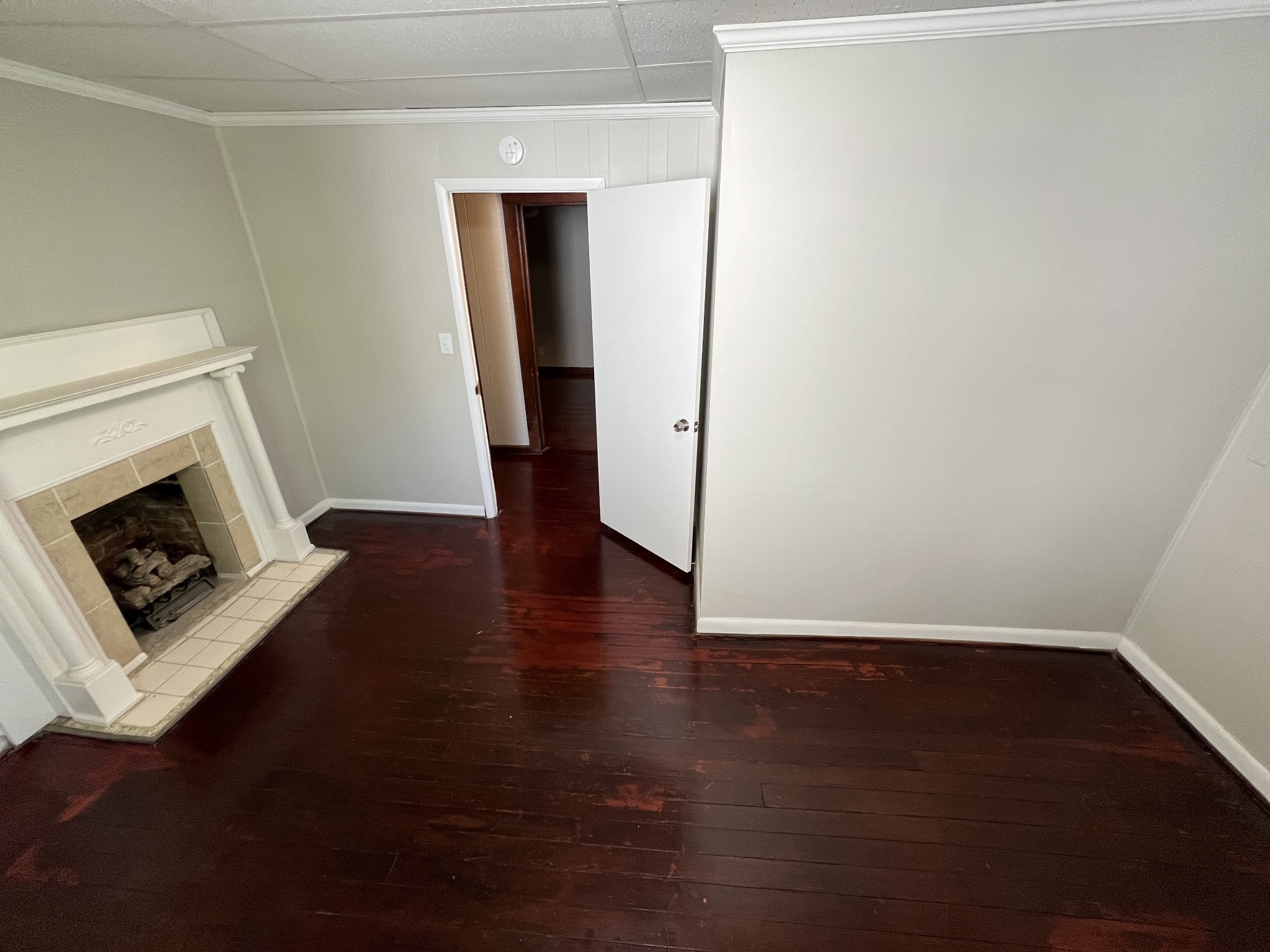 721 North Maple Street, Unit B Murfreesboro, TN 37130 - Photo 10 of 13 a view of a livingroom with wooden floor and a fireplace