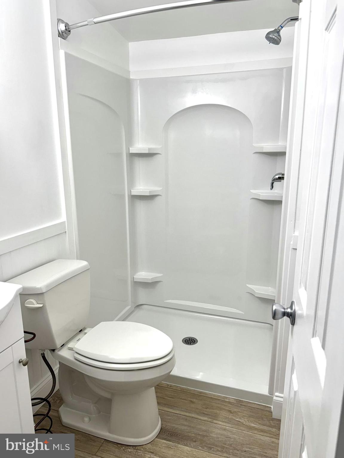 1616 North Main Street Williamstown, NJ 08094 - Photo 20 of 39 a bathroom with a toilet and a shower