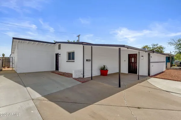 a view of a house with a garage