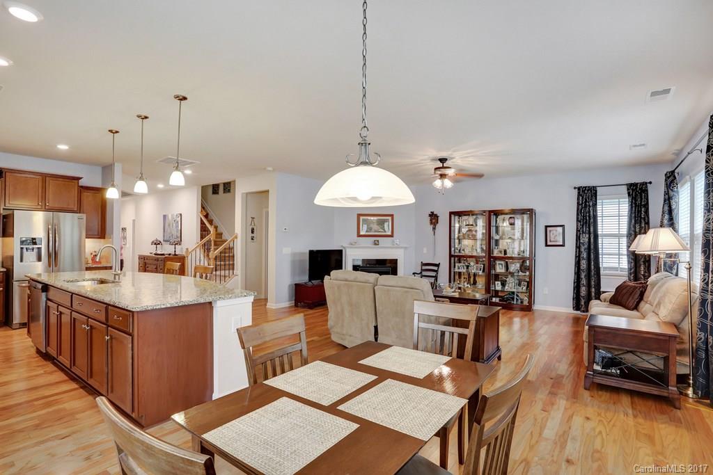 4135 Perth Road, Unit 374 Indian Land, SC 29707 - Photo 15 of 24 a large kitchen with a table and chairs in it