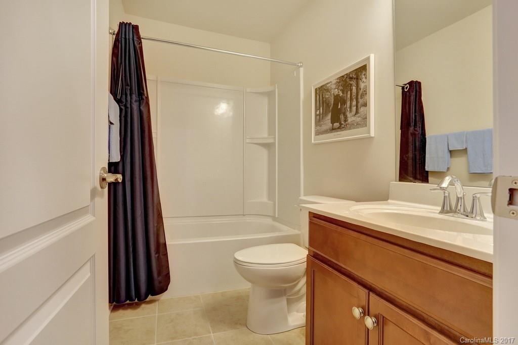 4135 Perth Road, Unit 374 Indian Land, SC 29707 - Photo 21 of 24 a bathroom with a sink a toilet and vanity