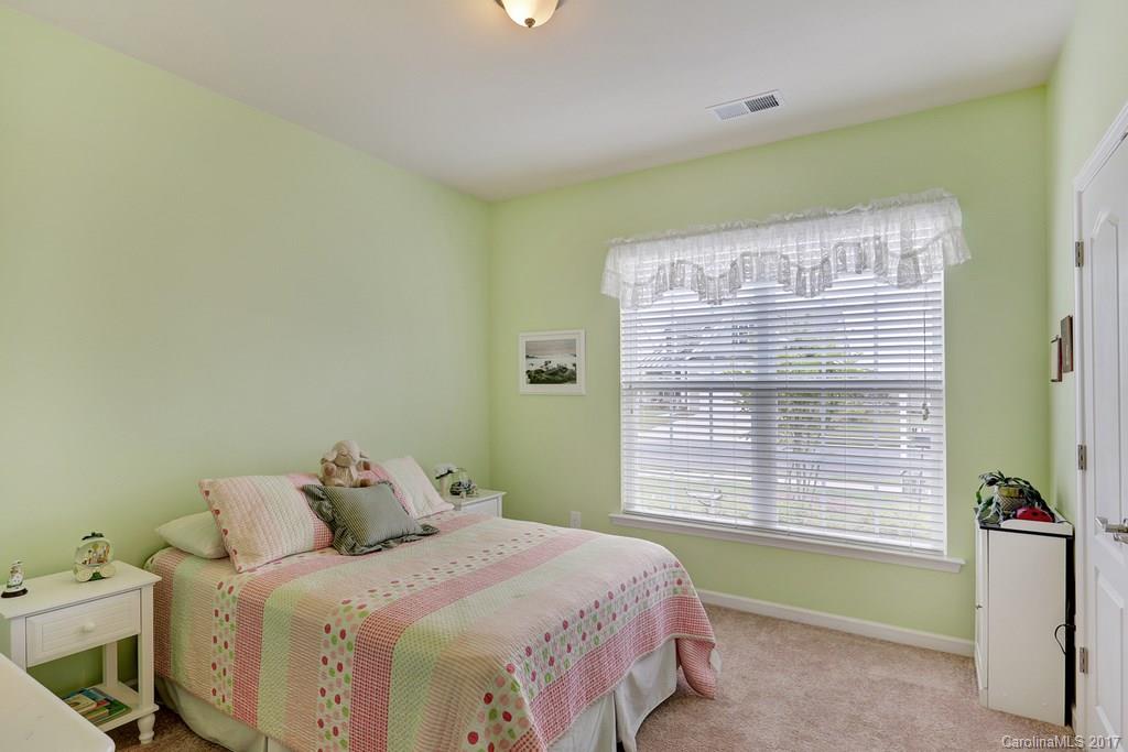 4135 Perth Road, Unit 374 Indian Land, SC 29707 - Photo 4 of 24 a bedroom with a bed and a window