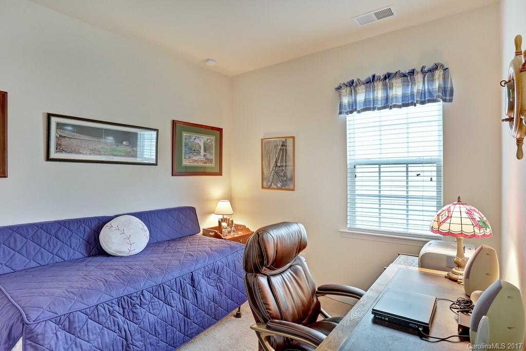 4135 Perth Road, Unit 374 Indian Land, SC 29707 - Photo 7 of 24 a bedroom with furniture and wooden floor