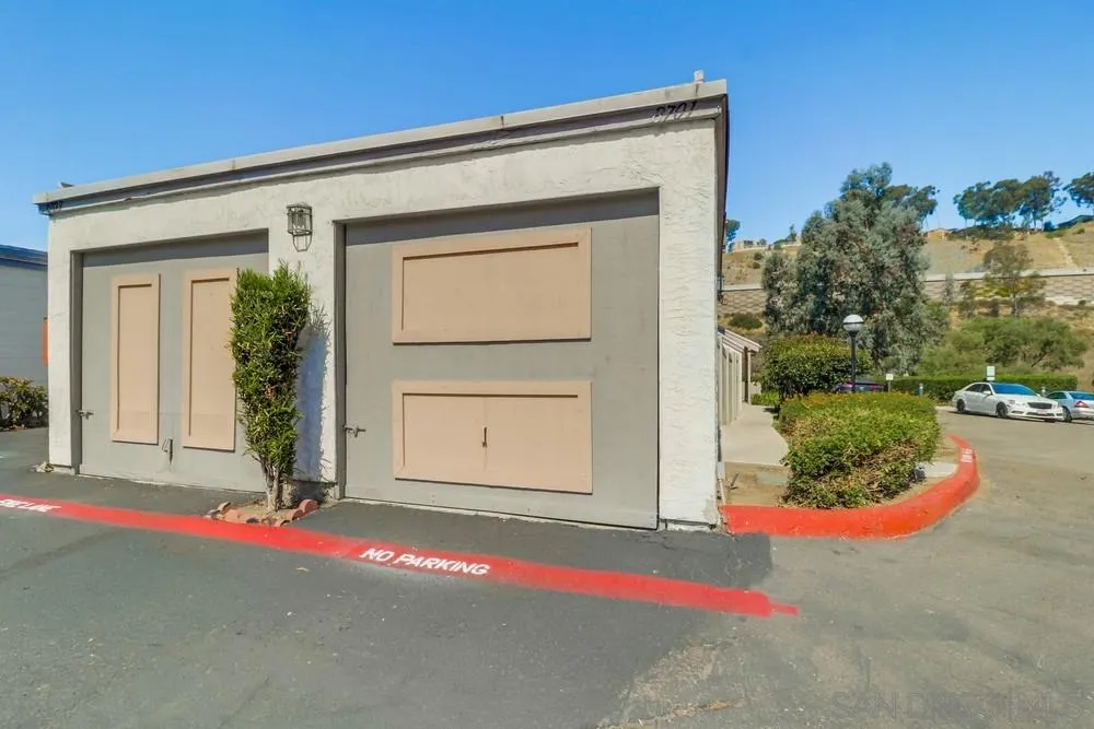8701 Spring Canyon Drive Spring Valley, CA 91977 - Photo 23 of 24 a front view of a house with a yard