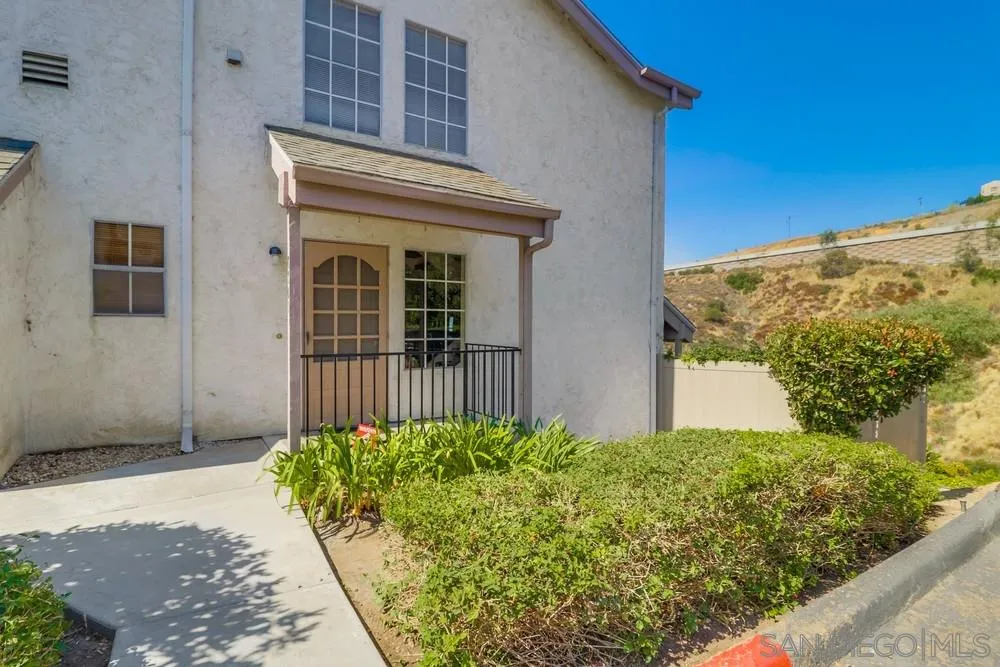 8701 Spring Canyon Drive Spring Valley, CA 91977 - Photo 24 of 24 a front view of a house with a yard