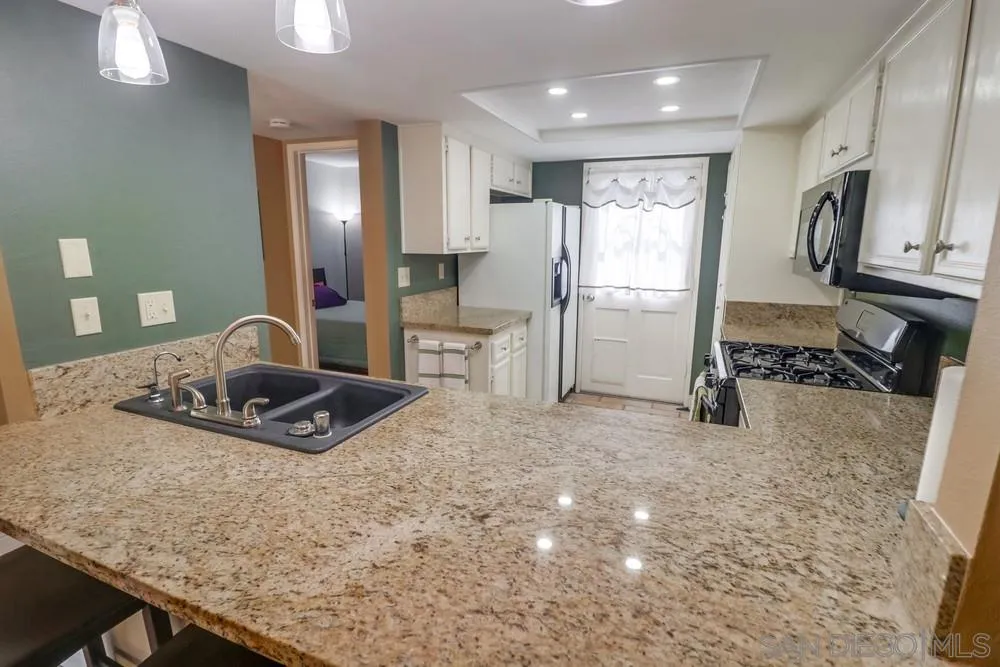 8701 Spring Canyon Drive Spring Valley, CA 91977 - Photo 4 of 24 a very nice looking room with a large window