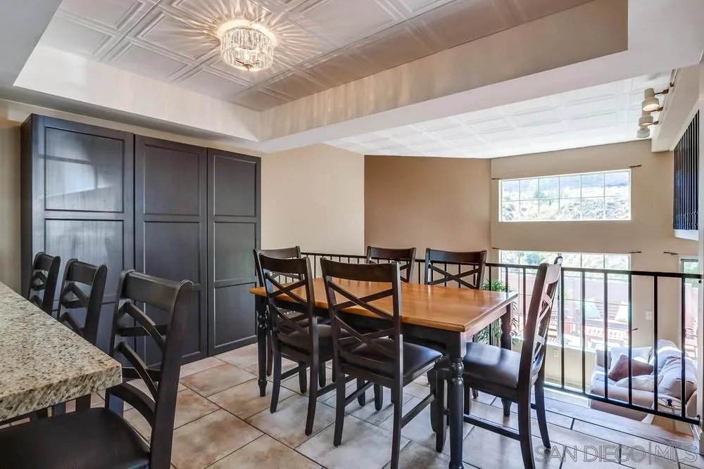 8701 Spring Canyon Drive Spring Valley, CA 91977 - Photo 6 of 24 a dining room with furniture and window