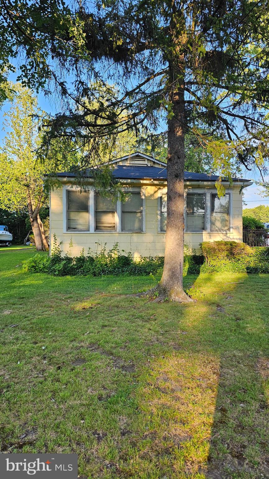 110 South Main Street Cranbury, NJ 08512 - Photo 1 of 10 a front view of a house with garden