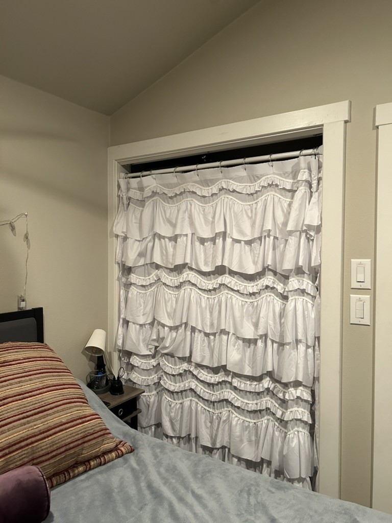 12922 Longstreet Road, Unit L10 Willis, TX 77318 - Photo 7 of 10 Spacious walk-in closet with ample storage and custom shelving.