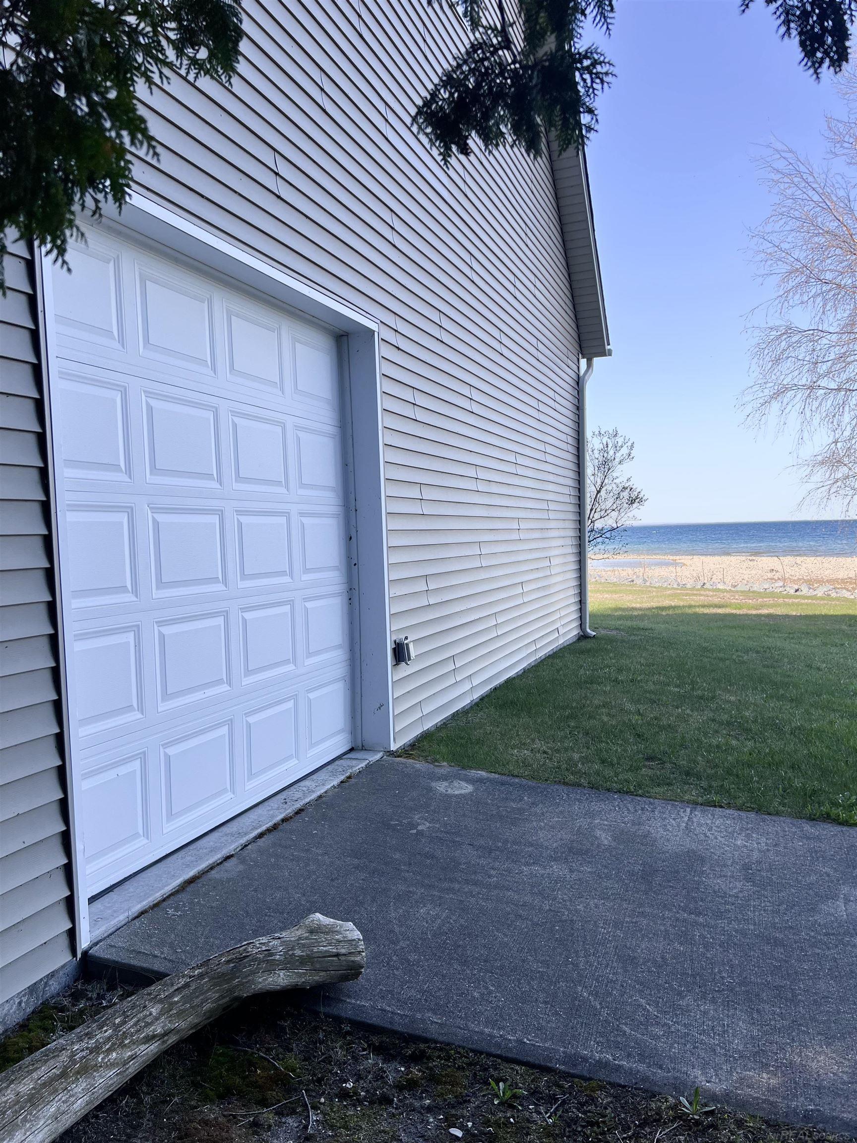 N934 Gros Cap Road St. Ignace, MI 49781 - Photo 80 of 96 Pole Barn Rear Door