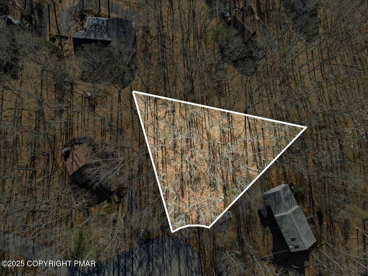 a view of roof with wooden floor and shower