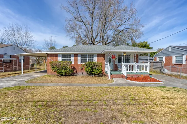 front view of a house with a yard