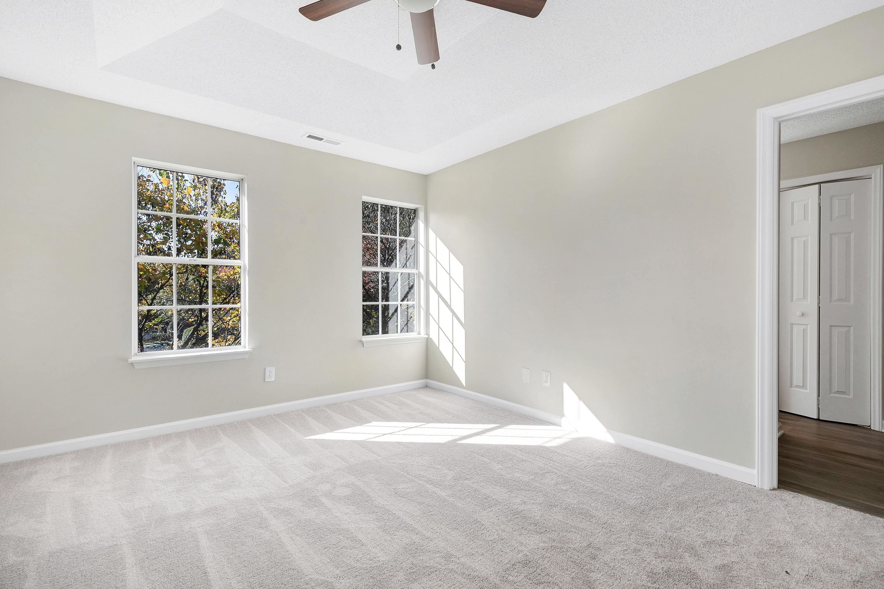 4424 Still Pines Drive Raleigh, NC 27613 - Photo 18 of 34 an empty room with windows
