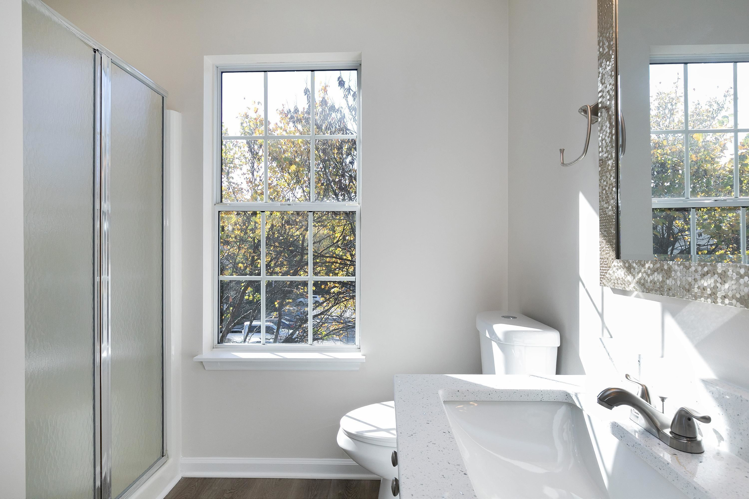 4424 Still Pines Drive Raleigh, NC 27613 - Photo 20 of 34 a bathroom with a sink and a mirror