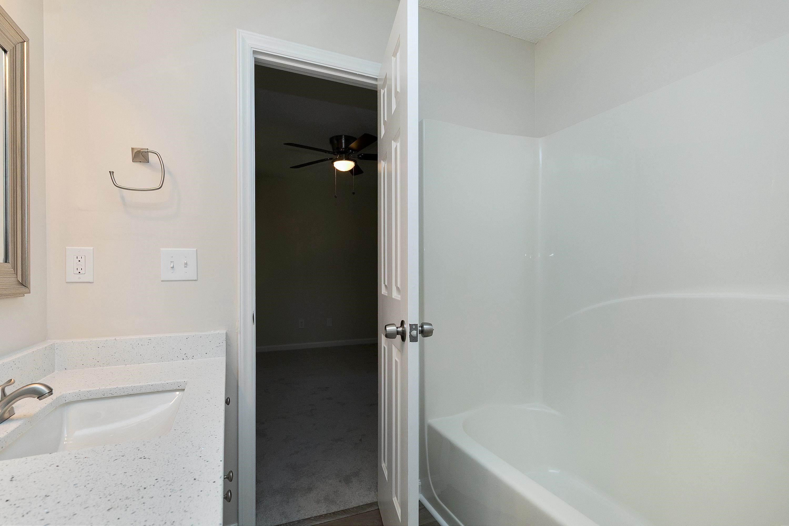 4424 Still Pines Drive Raleigh, NC 27613 - Photo 27 of 34 a bathroom with a bathtub