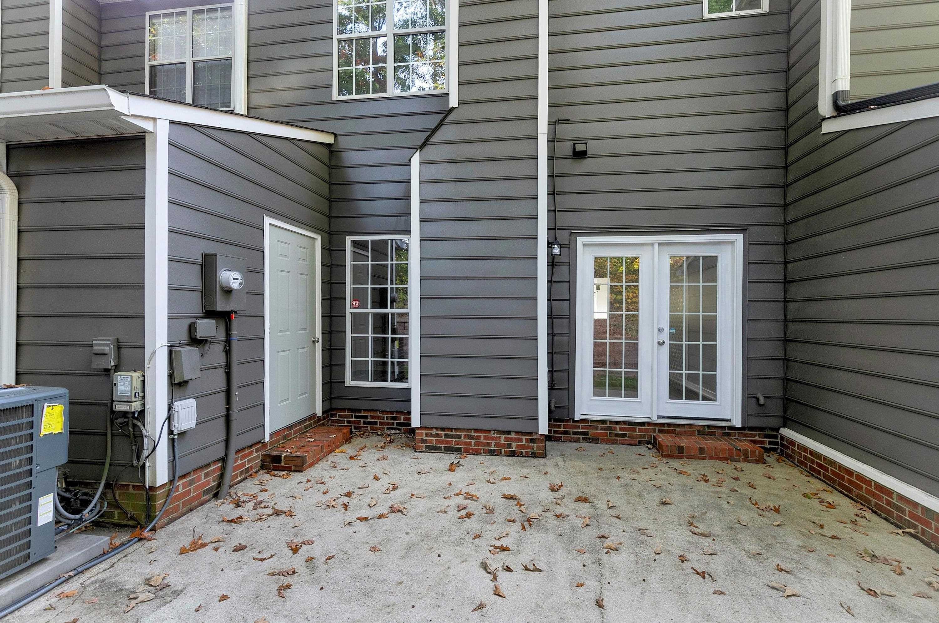 4424 Still Pines Drive Raleigh, NC 27613 - Photo 33 of 34 a view of house with door