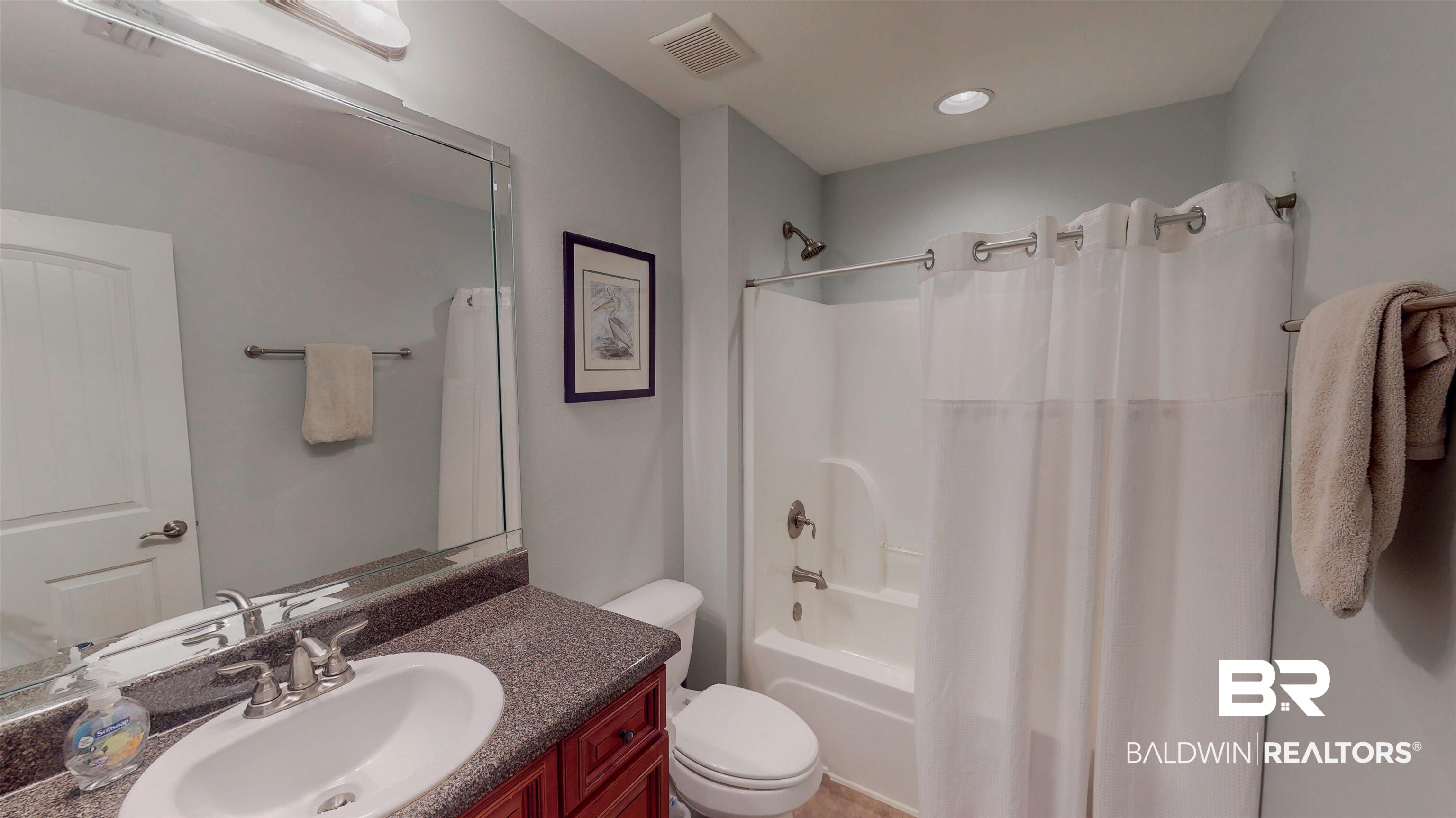 1704 Arcadia Drive Foley, AL 36535 - Photo 34 of 52 Bathroom with vanity and shower / bath combination with curtain