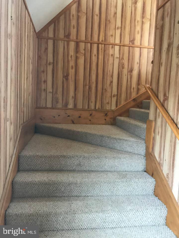 11077 Garland Road Denton, MD 21629 - Photo 34 of 52 Wide Staircase to living quarters in guest house