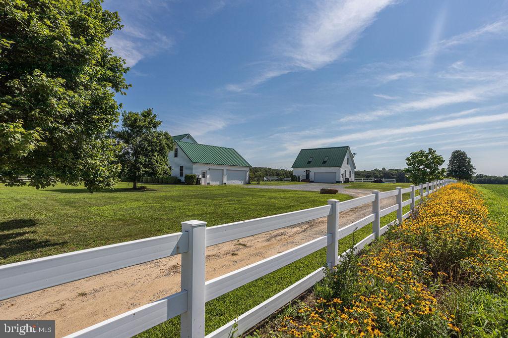 11077 Garland Road Denton, MD 21629 - Photo 4 of 52 split rail fencing with wild flowers
