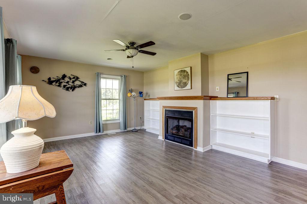 11077 Garland Road Denton, MD 21629 - Photo 6 of 52 Living Room with beautiful vinyl planking