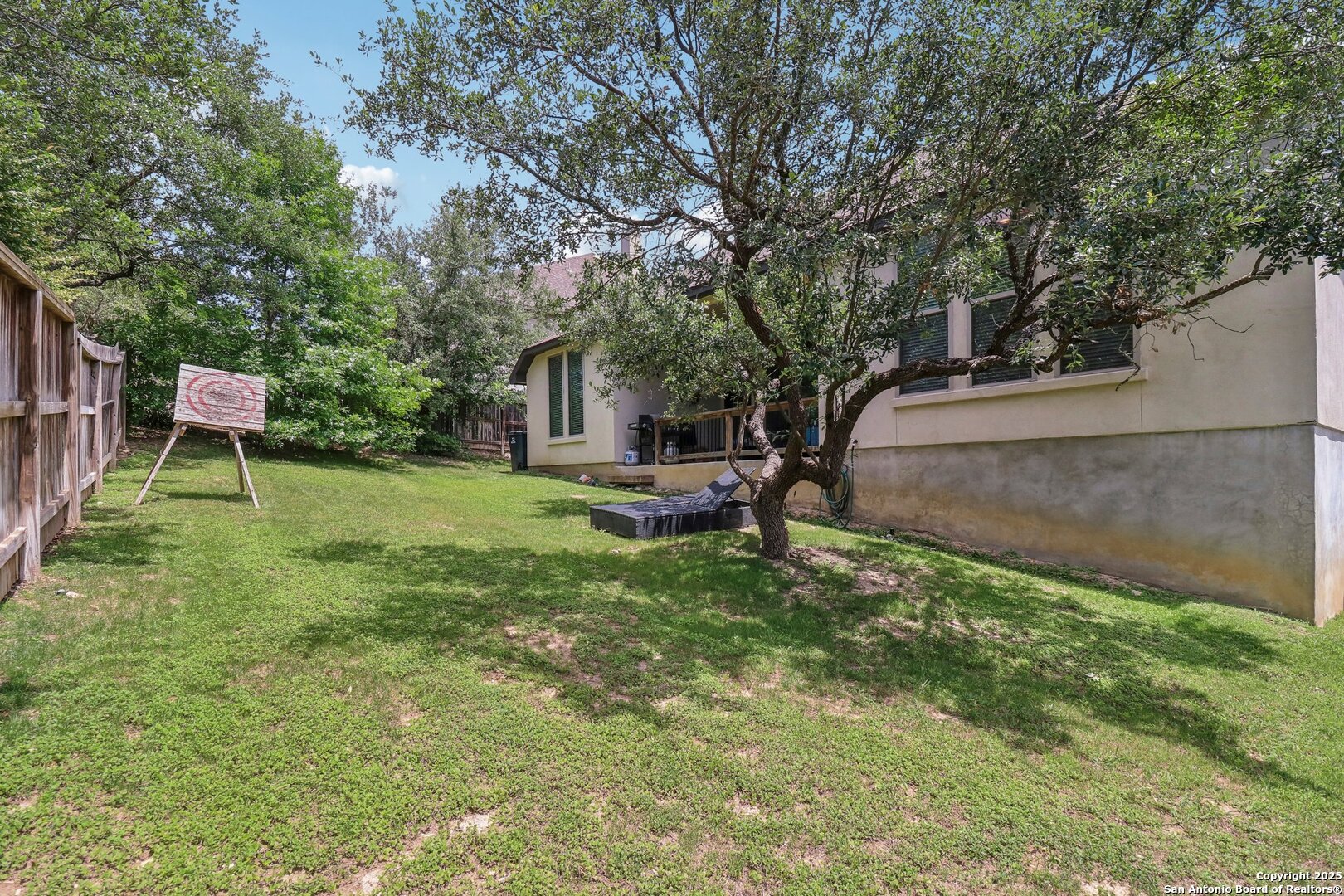 28115 Baldacci Vista Boerne, TX 78015 - Photo 16 of 18 a backyard of a house with table and chairs