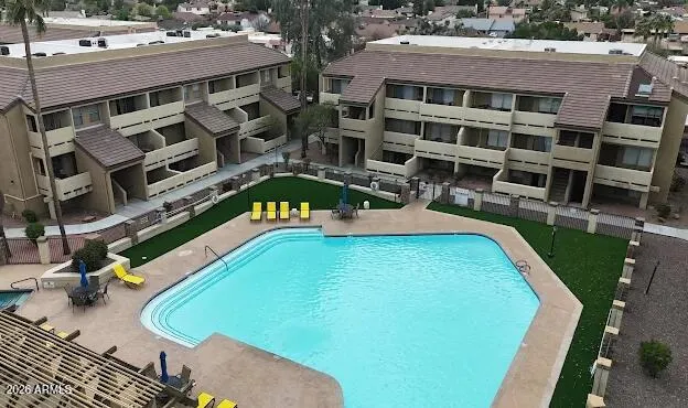 a view of a park with large trees