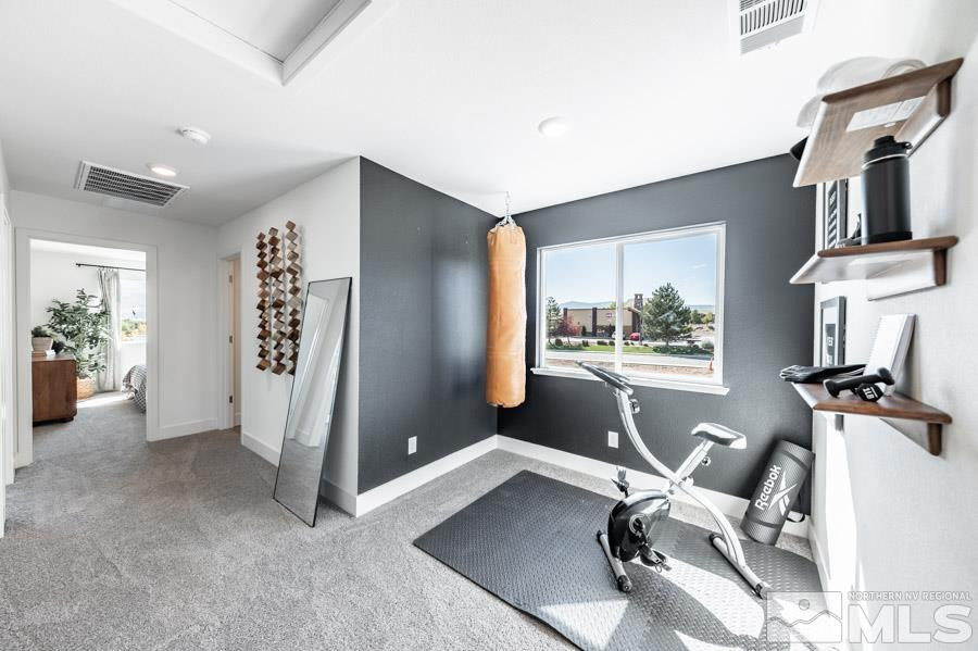 1621 Switchback Street, Unit LOT #25 Reno, NV 89523 - Photo 15 of 19 a view of a livingroom with furniture and a window