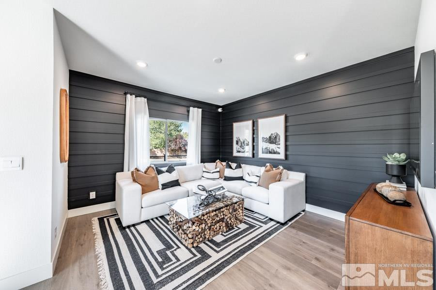 1621 Switchback Street, Unit LOT #25 Reno, NV 89523 - Photo 7 of 19 a living room with furniture and a fireplace