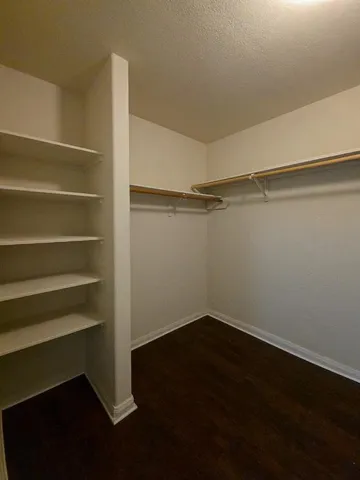a view of an empty walk in closet