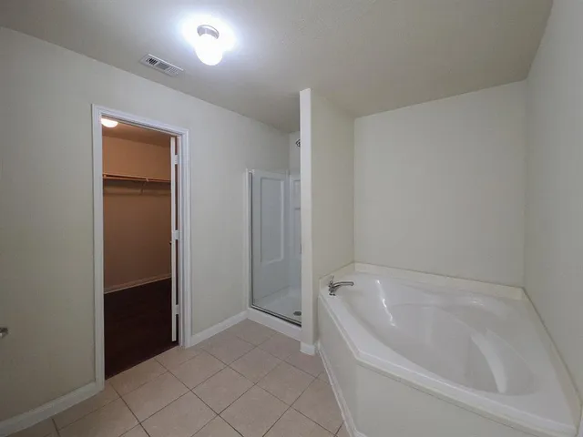 a bathroom with a bathtub