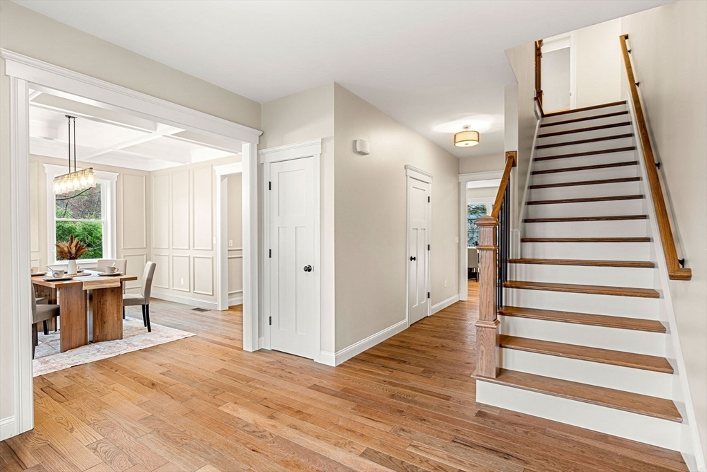 40 Boston Road Andover, MA 01810 - Photo 2 of 42 a view of a bedroom with wooden floor and stairs