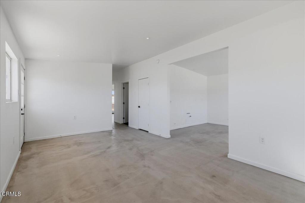 61714 Commercial Street Joshua Tree, CA 92252 - Photo 12 of 42 an empty room with an entryway