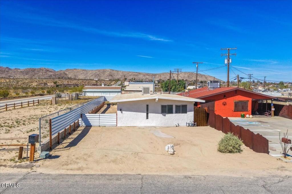 61714 Commercial Street Joshua Tree, CA 92252 - Photo 2 of 42 a view of a house with a terrace